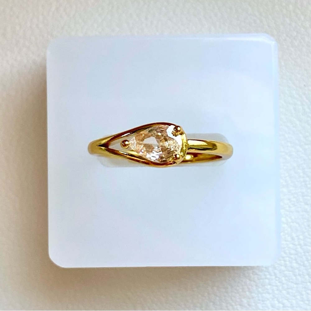 Gold Pear-Cut Solitaire Ring with Champagne Stone